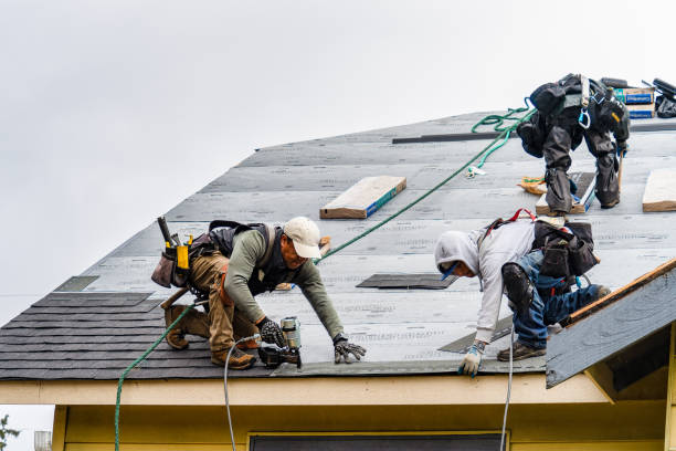 Professional Gutter Installation technician working in Medford, OK